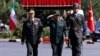 Turkish Chief of Staff General Hulusi Akar and his Iranian counterpart Major General Mohammad Baqeri review the guards of honor during a welcoming ceremony in Ankara, Turkey, Aug. 15, 2017. 