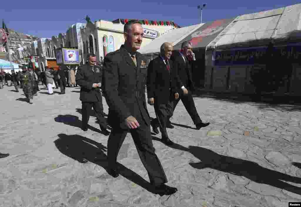 International Security Assistance Force Commander General Joseph Dunford leaves from the Loya Jirga after its opening ceremony in Kabul, Nov. 21, 2013.