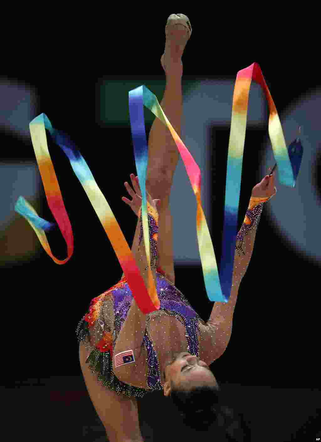Malaysia's Amy Kwan competes in the Women's Rhythmic Gymnastics Ribbon Apparatus final of the 29th South East Asian Games in Kuala Lumpur, Malaysia, Aug. 28, 2017.