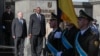 Ukrainian Defense Minister Andriy Taran, left, and U.S. Defense Secretary Lloyd Austin review the honor guard during a welcome ceremony ahead of their meeting in Kyiv, Ukraine, Oct. 19, 2021. 