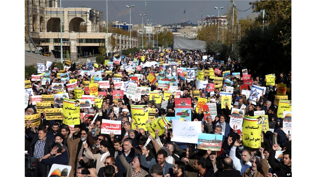 FILE - Iranian worshippers chant slogans in a rally after Friday prayer in Tehran, Iran, Dec. 8, 2017. Hundreds rallied to show their anger after the Trump administration's recognition of Jerusalem as Israel's capital.