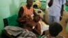 FILE - A Sudan People's Liberation Movement soldier, wounded in a Sudanese air force bombing in South Kordofan, lies in a hospital in Gidel, April 30, 2012.