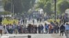 Demonstrators block the San Isidro bridge at the entrance to Arequipa, Peru, during protests to call for the resignation of President Dina Boluarte, on Jan. 19, 2023.