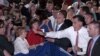Republican presidential candidate, former Massachusetts Gov. Mitt Romney waves to members of the Veterans of Foreign Wars after his speech at the VFW national convention in Reno, Nev. Tuesday July 24, 2012.