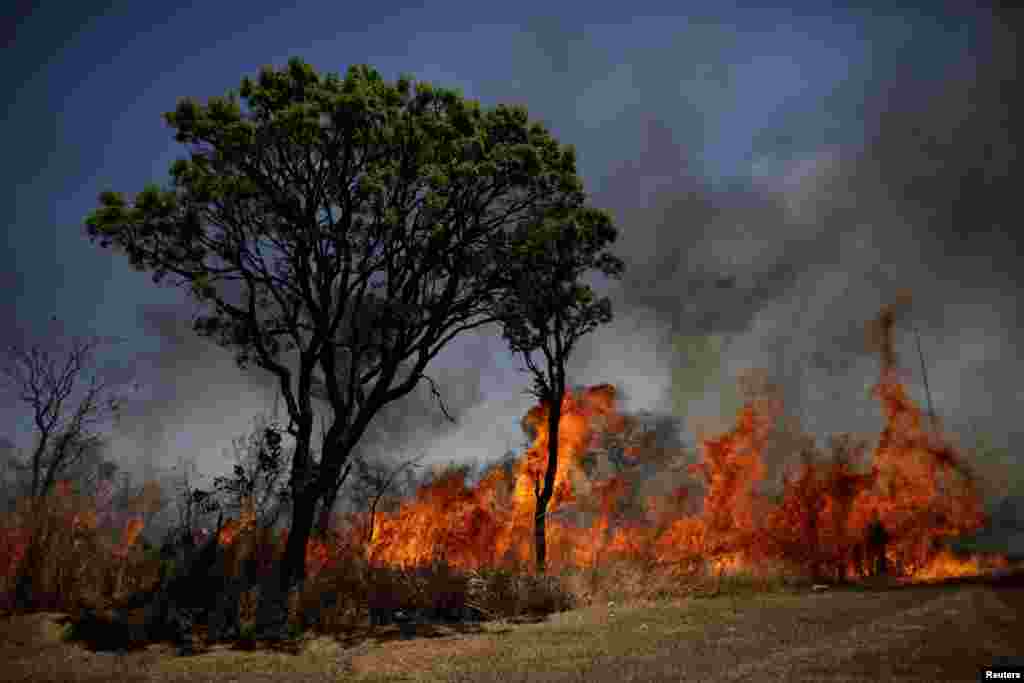 View of the devastation caused by a forest fire in front of Brasilia's National Park, in Brasilia, Brazil, Sept. 19, 2017.
