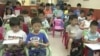 Private language schools offering American English are growing in the former British colony, where public schools still teach largely British English.