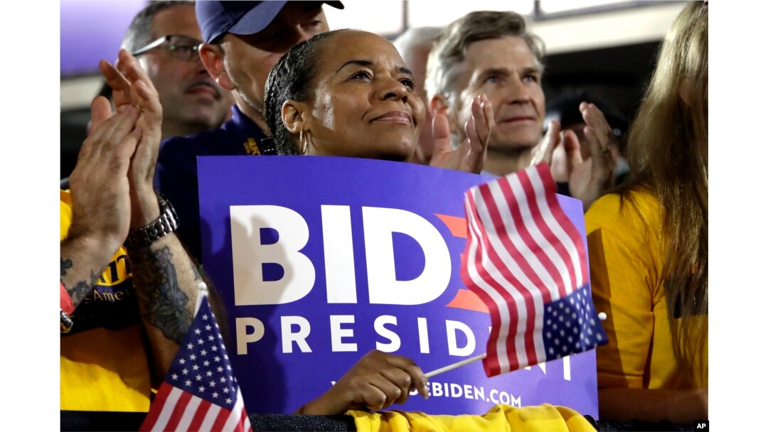 People applaud as former Vice President and Democratic presidential candidate Joe Biden speaks during a rally at the Teamster Local 249 Hall in Pittsburgh, April 29, 2019.