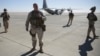 Out going U.S. Marine Brigadier Gen. Roger B. Turner walks on the airfield after the change of command ceremony in Shorab military camp of Helmand province, Afghanistan, Jan. 15, 2018. 