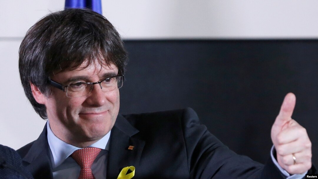 Carles Puigdemont, the dismissed president of Catalonia, arrives to speak after watching the results of Catalonia's regional election in Brussels, Belgium, Dec. 21, 2017.