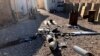 Parts of the wreckage of a drone are laid out on the ground near the Ain al-Asad airbase, in the western Anbar province of Iraq, Jan. 4, 2022. 