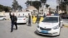 A member of Libyan security forces gestures after armed groups aligned with a U.N.-backed government took over a compound occupied by a self-declared rival prime minister in heavy fighting, in Tripoli, Libya, March 15, 2017. 