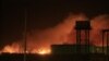 Fire engulf the Yarmouk ammunition factory in Khartoum on October 24, 2012.