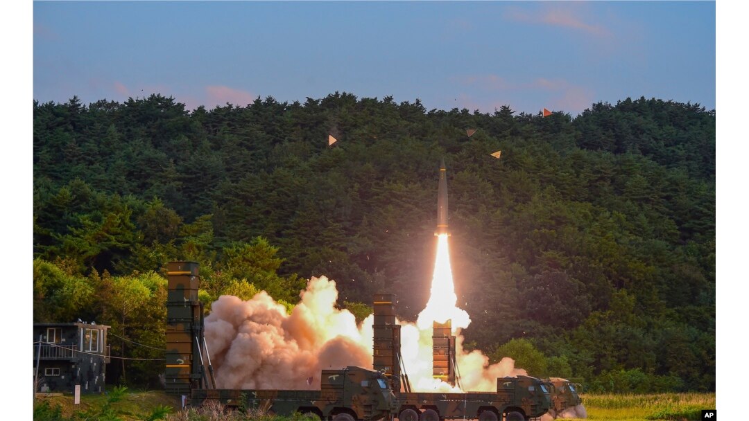 In this photo provided by South Korea Defense Ministry, a Hyunmoo II ballistic missile is fired during an exercise at an undisclosed location in South Korea, Sept. 4, 2017. South Korea's military said it conducted a live-fire exercise simulating an attack on North Korea's nuclear test site to "strongly warn" Pyongyang over the latest nuclear test.