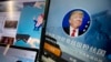 FILE - Chinese fan websites for Donald Trump are displayed on a computer with the words "Donald J. Trump super fan nation, Full and unconditional support for Donald J. Trump to be elected U.S. president" in Beijing, China.