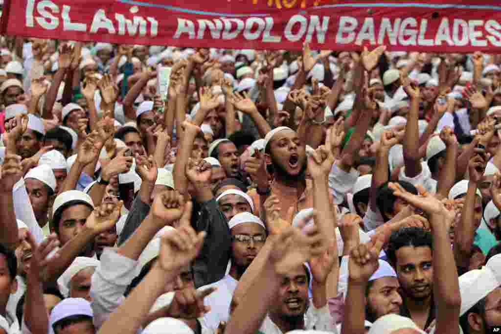 Bangladeshi Muslims shout slogans as they participate in a protest in Dhaka, Bangladesh, Sept. 14, 2012.