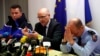 Marseille prosecutor Brice Robin, center, with Gen. David Galtier, right, holds a press conference in Marseille, southern France, March 26, 2015.