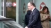Geneva's Attorney General Olivier Jornot leaves a HSBC Swiss branch of the bank in Geneva, Feb. 18, 2015.