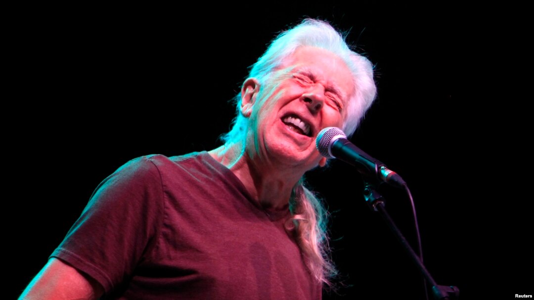 FILE - Blues legend John Mayall performs during a concert in Bucharest, Romania, Nov. 11, 2012.