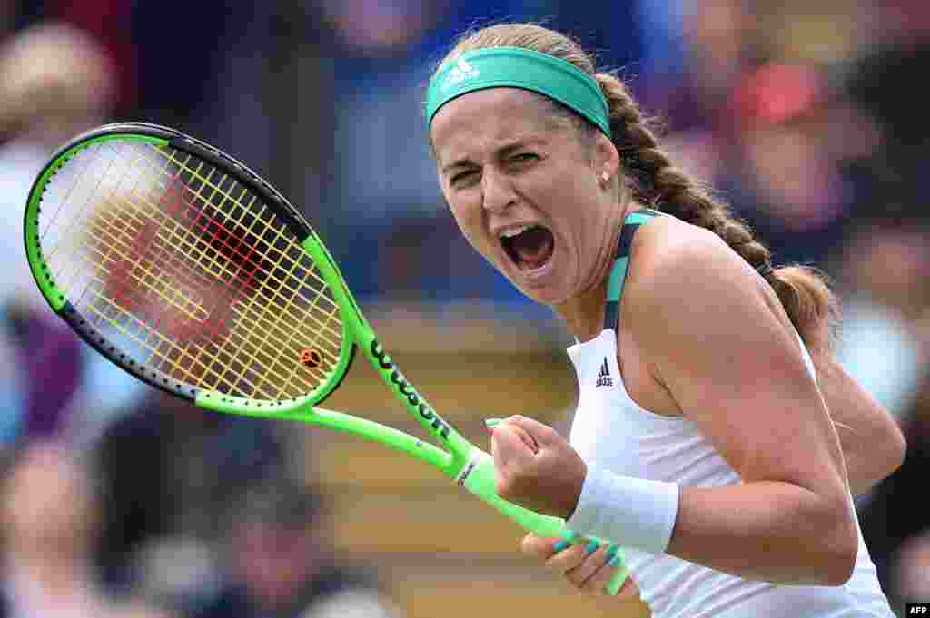 Latvia's Jelena Ostapenko celebrates after winning the second set against Britain's Johanna Konta during their women's singles third round tennis match at the ATP Aegon International tennis tournament in Eastbourne, southern England.