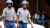 Zimbabwean police patrol the streets of the capital Harare, March 1, 2011. 