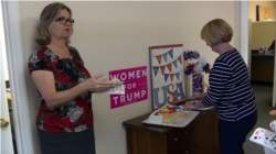 Trump campaign volunteers Linda Trocine and Hillary Courson shares cake to celebrate the president's birthday. (VOA video grab)