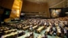 FILE - People gather at the General Assembly, prior to a vote, Dec. 21, 2017, at United Nations headquarters in New York.