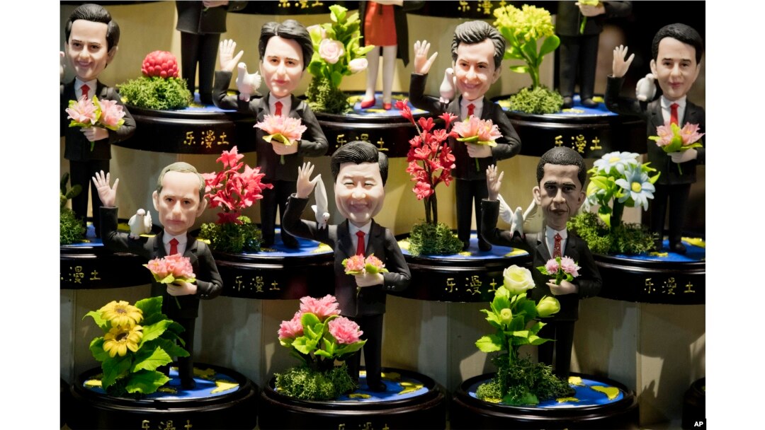 Clay figures, showing U.S. President Barack Obama, Chinese President Xi Jinping and Russian President Vladimir Putin amongst other state leaders expected to attend the G20 summit are displayed at a shop in Hangzhou in eastern China's Zhejiang province.