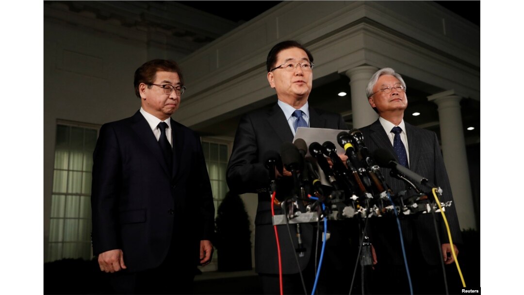 South Korea's National Security Office head Chung Eui-yong, Cho Yoon-je, the South Korean Ambassador to the U.S., and National Intelligence Service chief Suh Hoon, left, make an announcement about North Korea and the Trump administration outside of the West Wing at the White House in Washington, March 8, 2018.