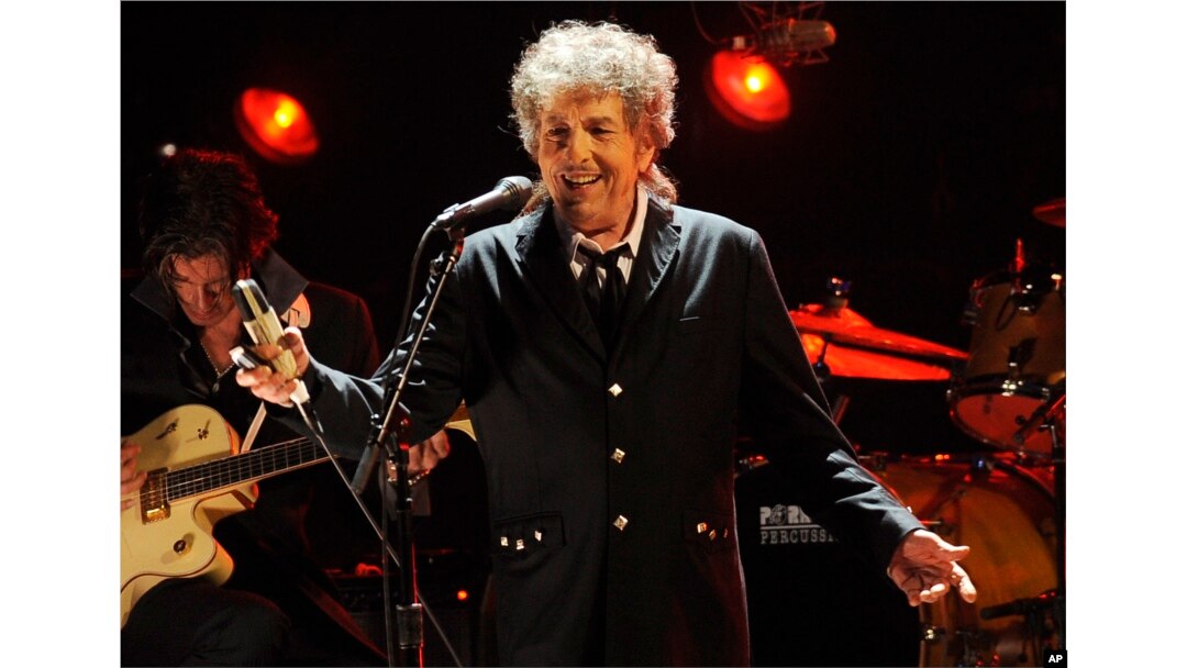 FILE - In this Jan. 12, 2012, file photo, Bob Dylan performs in Los Angeles.