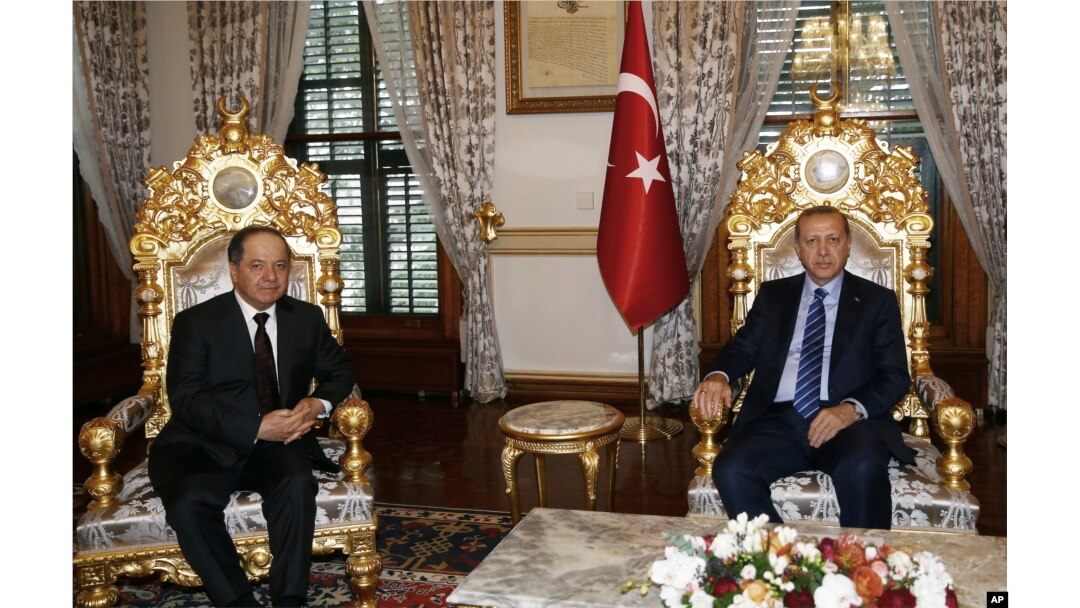 FILE - Turkey's President Recep Tayyip Erdogan, right, and Iraqi Kurdish leader Massoud Barzani are seen prior to their meeting in Istanbul, Feb. 26, 2017. Ankara has been courting Barzani in its fight against the PKK and groups affiliated with it.