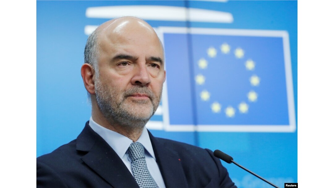 FILE - European Commissioner for Economic and Financial Affairs Pierre Moscovici attends a news conference in Brussels, Belgium, Dec. 4, 2018.