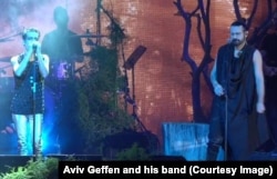 Exiled Iranian rock musician Shahin Najafi, right, sang alongside Israeli rock star Aviv Geffen, left, at a concert in Tel Aviv -- the first performance by an Iranian artist at an Israeli rock concert -- on March 2, 2017.