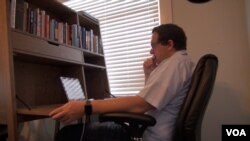 The shared workspace allows writers to escape the distractions of home and interact with other writers. (M. O'Sullivan/VOA)