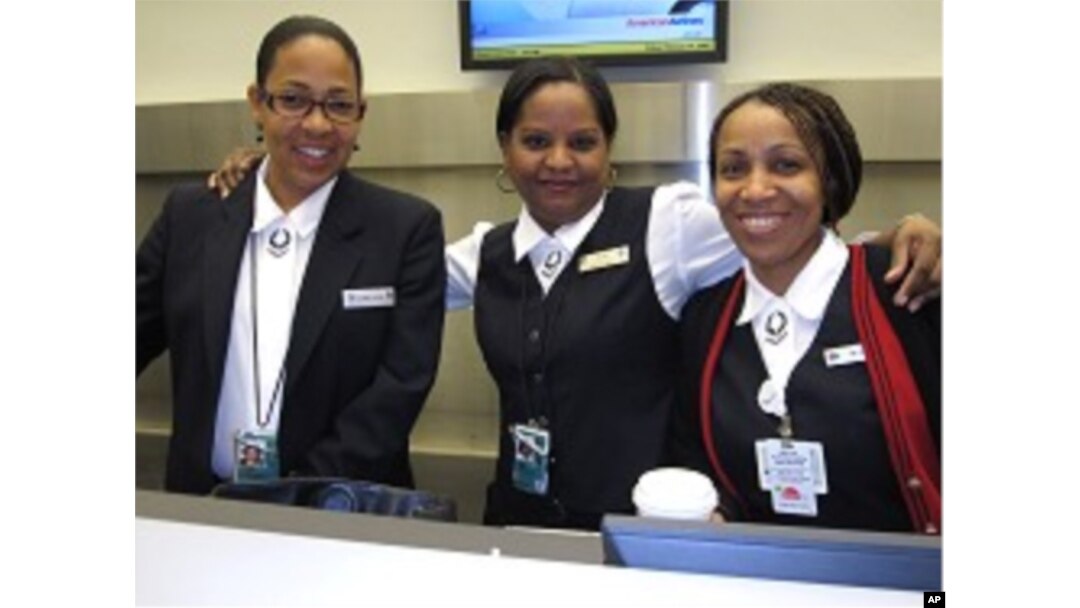 Employees working behind the American Airlines counter were surprised to arrive at 4:00 am to find hundreds already lined up to check in, 19 Feb. 2010