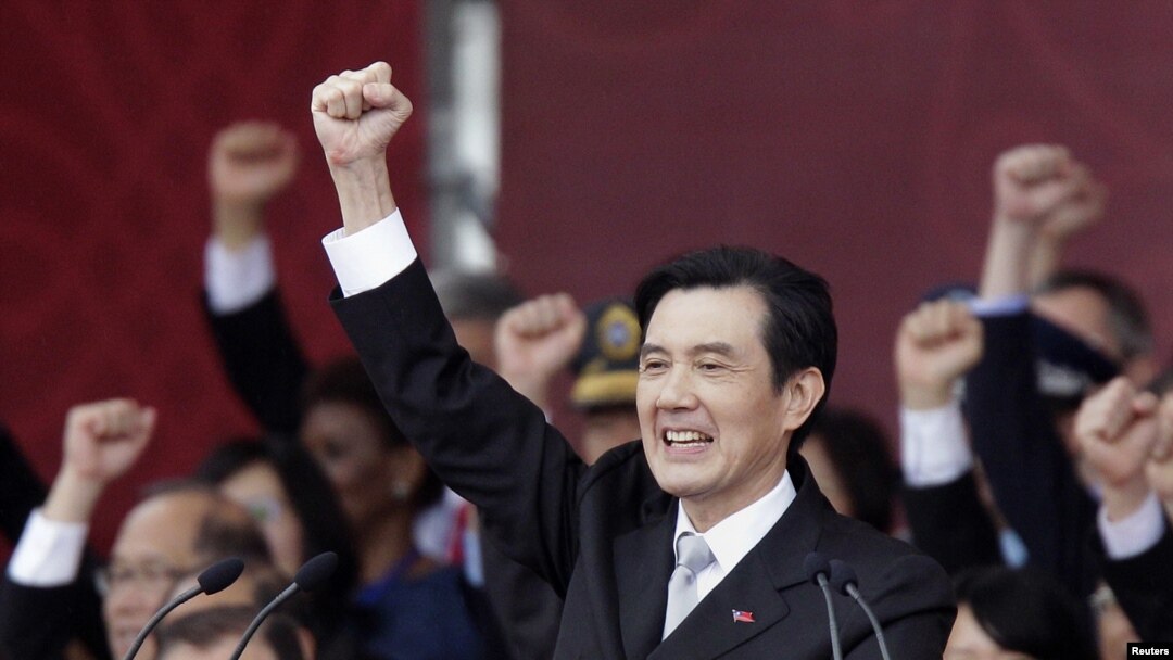 Taiwan's President Ma Ying-jeou raises his fist after giving a speech during National Day celebrations in front of the presidential office in Taipei October 10, 2012.