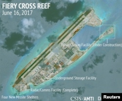 Construction is shown on Fiery Cross Reef in the Spratly Islands, the disputed South China Sea, in this June 16, 2017, satellite image released by CSIS Asia Maritime Transparency Initiative at the Center for Strategic and International Studies.
