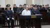 谢伦伯格被带进法庭的画面（路透社2019年资料照）