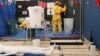 MSF volunteer receives training on how to handle personal protective equipment during Ebola response courses, Brussels, Oct., 15, 2014.