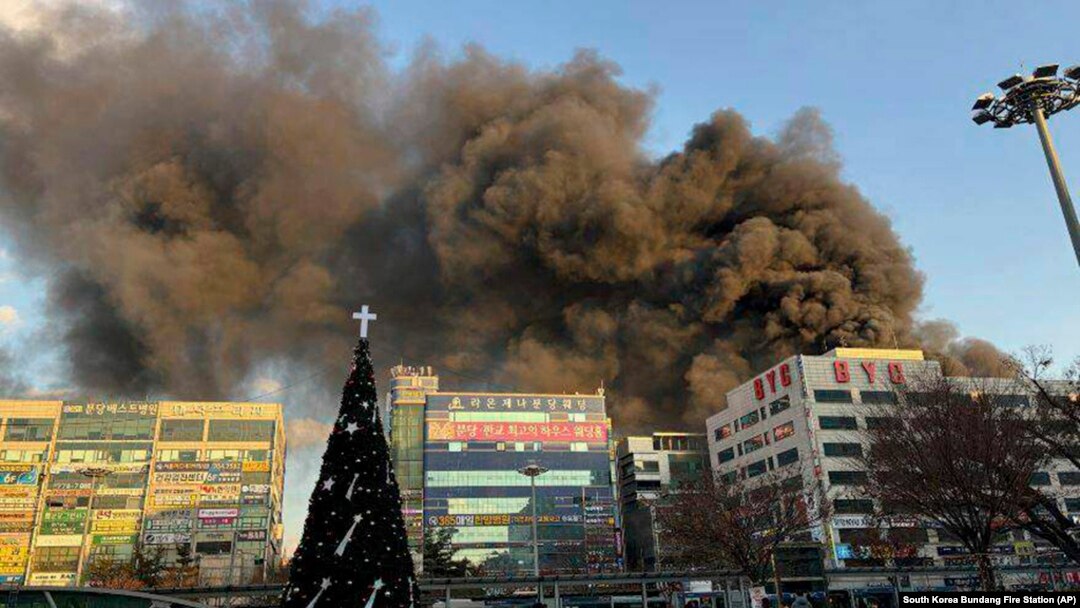 Smoke rises at the scene of a fire at a commercial building in Seongnam, South Korea, Jan. 3, 2025.