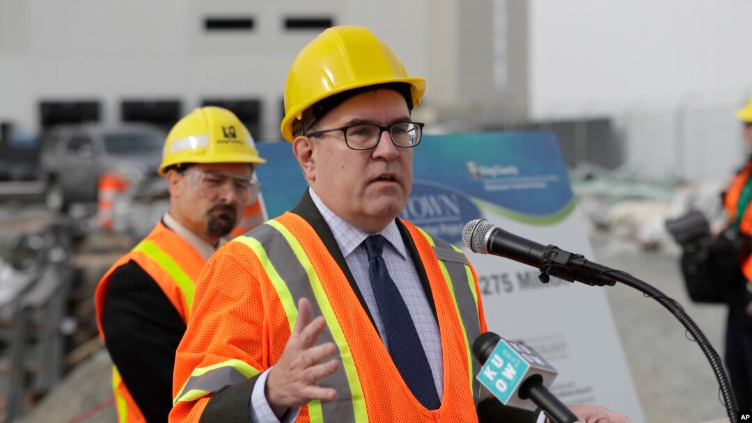 FILE - Andrew Wheeler, the U.S. Environmental Protection Agency's Acting Administrator, talks to reporters, Oct. 3, 2018, after touring the Georgetown Wet Weather Treatment Station in Seattle.