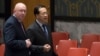 Russian Ambassador to the United Nations Vassily Nebenzia, left, speaks to Chinese Ambassador to the United Nations Ma Zhaoxu before a Security Council meeting on the situation in Syria, at United Nations headquarters, Feb. 23, 2018.