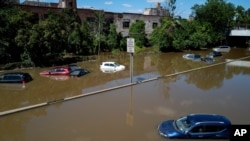 Cars and trucks are stranded by high water, Sept. 2, 2021, on the Major Deegan Expressway in Bronx borough of New York as high water left behind by Hurricane Ida still stands on the highway hours later.