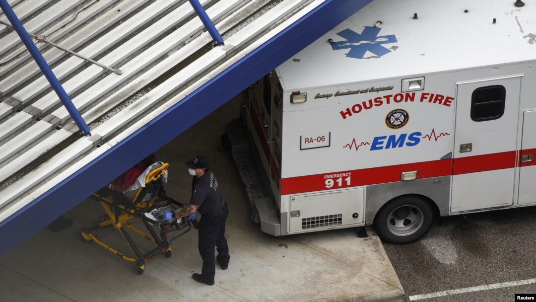 FILE - A patient is wheeled into Houston Methodist Hospital amid the global outbreak of the coronavirus disease (COVID-19), in Houston, Texas, June 22, 2020. 