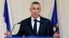 FILE - Prosecutor Francois Molins speaks to reporters in Paris after it was learned that French national Maxime Hauchard was among Islamic State members filmed as they executed Syrian soldiers, Nov. 17, 2014.