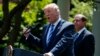 Secretary of Health and Human Services Alex Azar looks on as President Donald Trump speaks during an event about prescription drug prices in the Rose Garden of the White House, May 11, 2018, in Washington. 