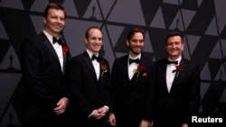John Lynch (from left), Mark Tucker, Jeff Lait and Cristin Barghiel, recipients of Scientific and Engineering Award for Houdini visual effects and animation system, pose at the Scientific and Technical Awards presented by the Academy of Motion Picture Art and Sciences in Beverly Hills, California, Feb. 10, 2018. 