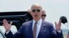 President Joe Biden responds to reporters' questions about infrastructure as he arrives at Lehigh Valley International Airport in Allentown, Pennsylvania, July 28, 2021. 