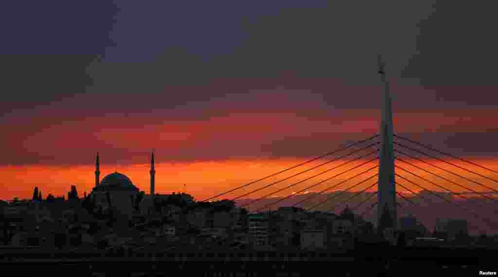 The sun sets over the Golden Horn in Istanbul, Turkey.