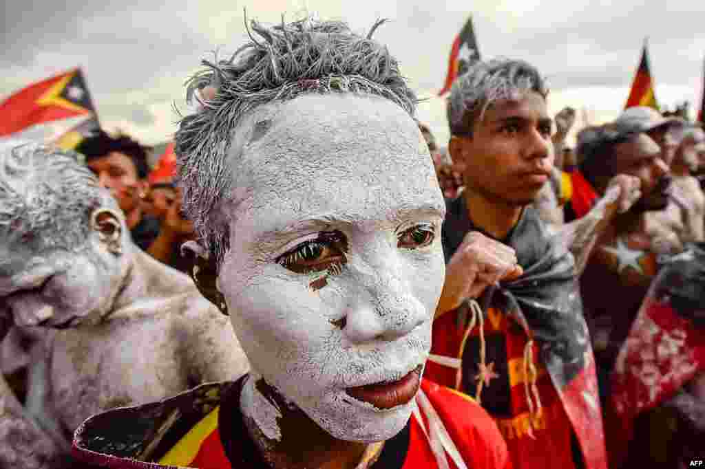 Fretilin party supporters participate in an election campaign rally in Dili, East Timor.