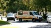 An ambulance believed to be transporting former South African president Nelson Mandela arrives at his house in Houghton, April 6, 2013. 
